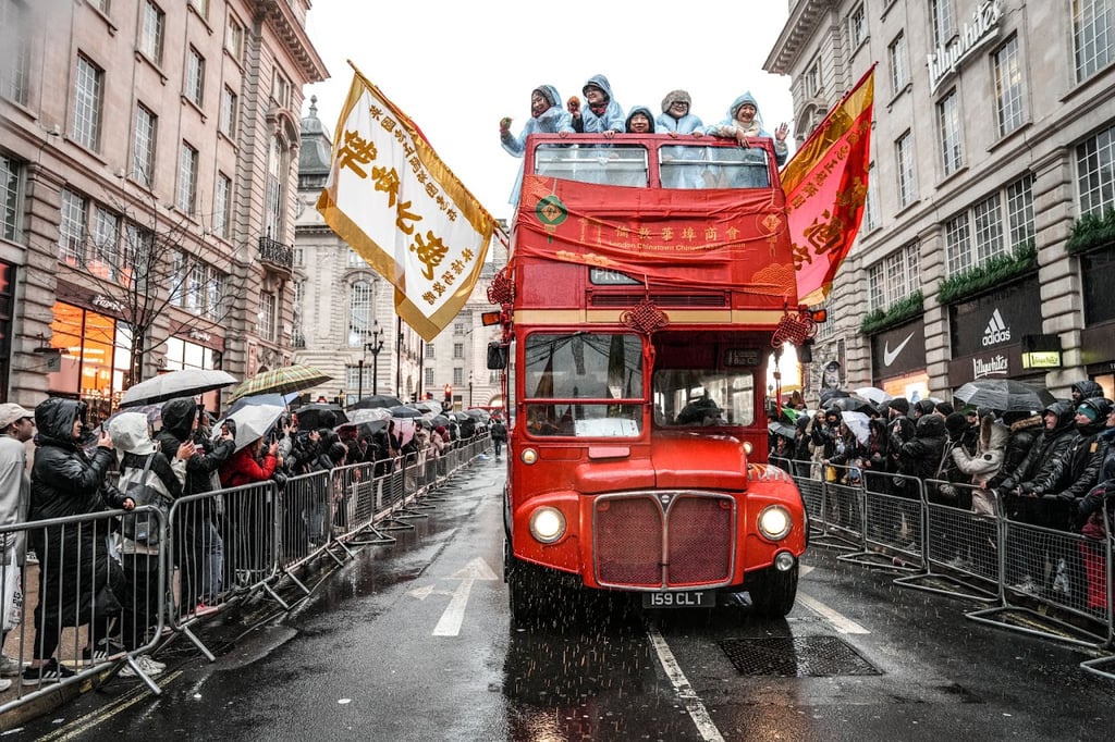 London New Year Day Parade with a decorated bus and performers