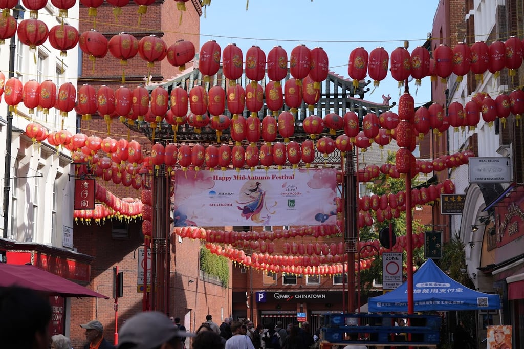 Happy Mid-Autumn Festival banner and red lanterns for Moon Festival