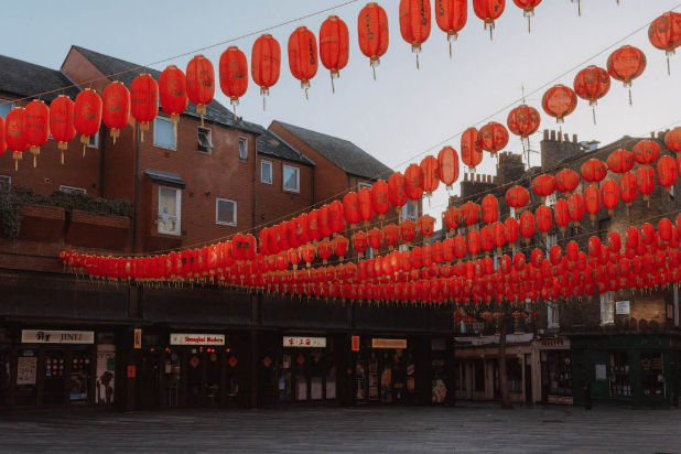 Red lanterns strung above Chinatown for the Night Market